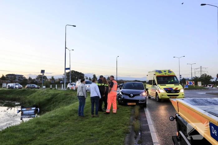 Auto te water na aanrijding