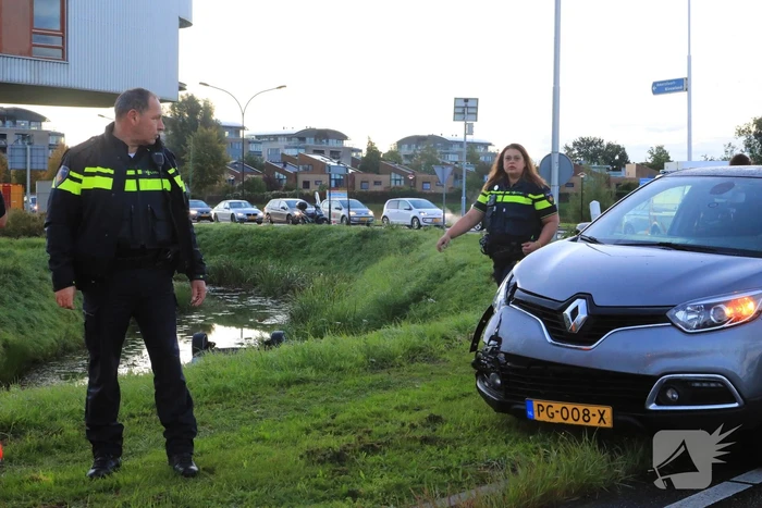 Auto te water na aanrijding