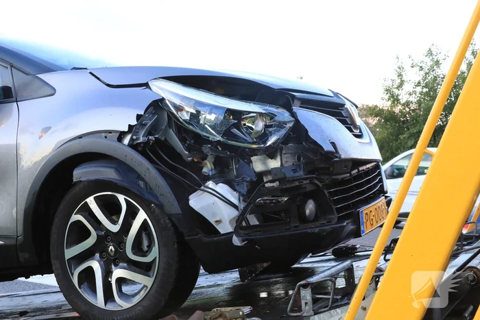 Auto te water na aanrijding