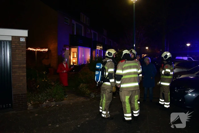 Woonkamer vol rook door schoorsteenbrand
