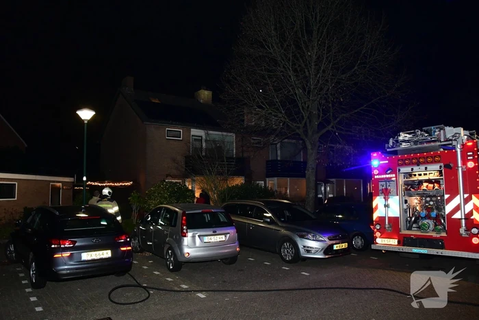 Woonkamer vol rook door schoorsteenbrand