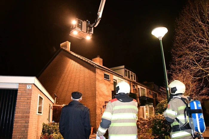 Woonkamer vol rook door schoorsteenbrand