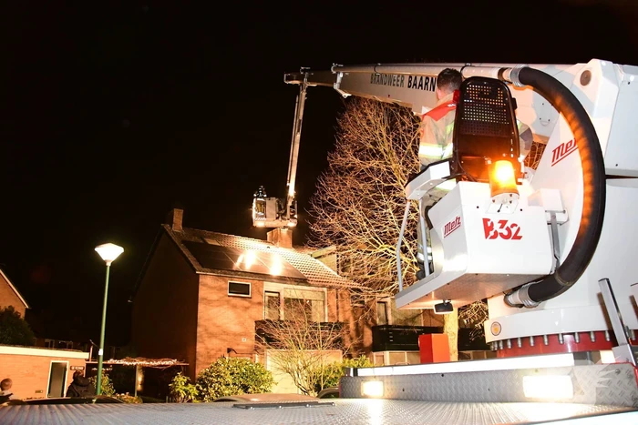 Woonkamer vol rook door schoorsteenbrand