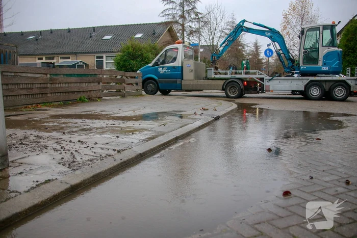 Straat blank na waterleidingbreuk