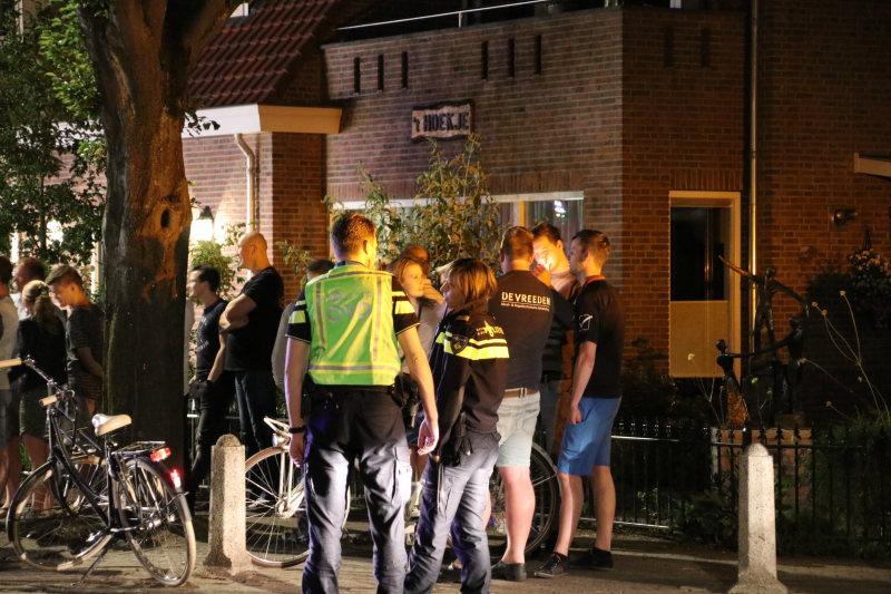 Uitslaande woningbrand boven winkel