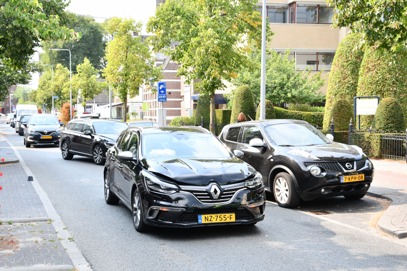 Lange file door fikse kop-staartaanrijding
