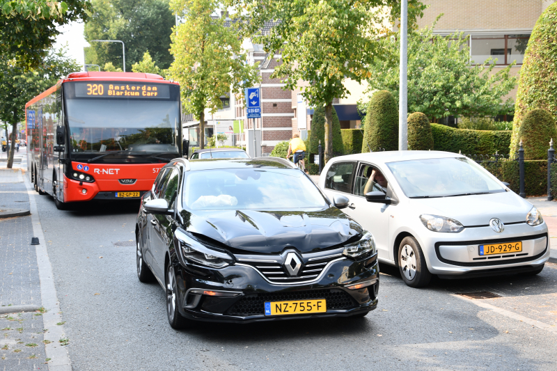 Lange file door fikse kop-staartaanrijding