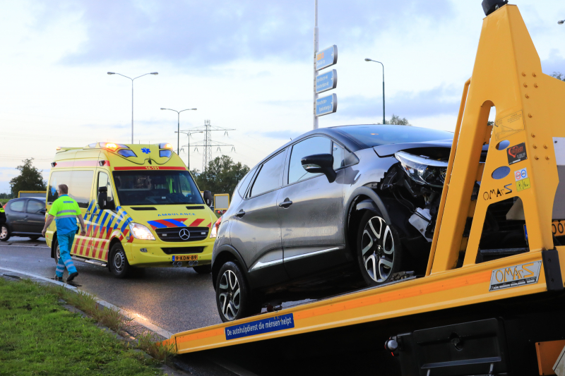 Auto te water na aanrijding