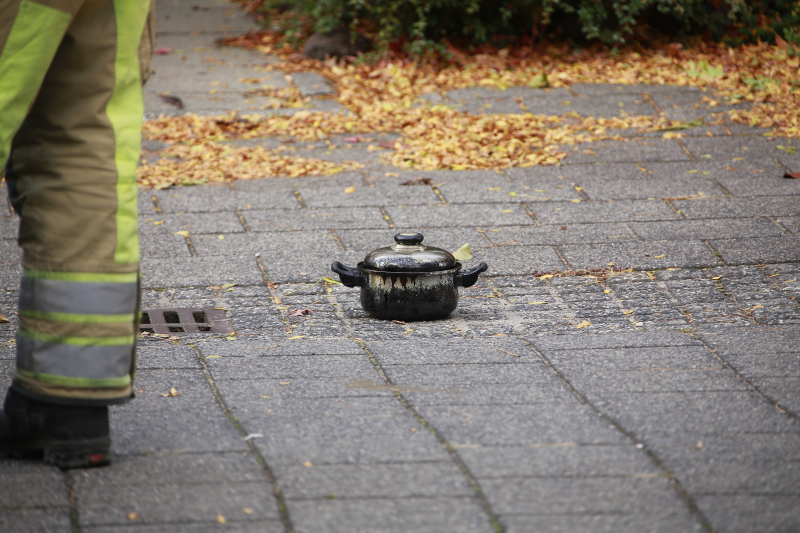 Rook door pannetje op het vuur