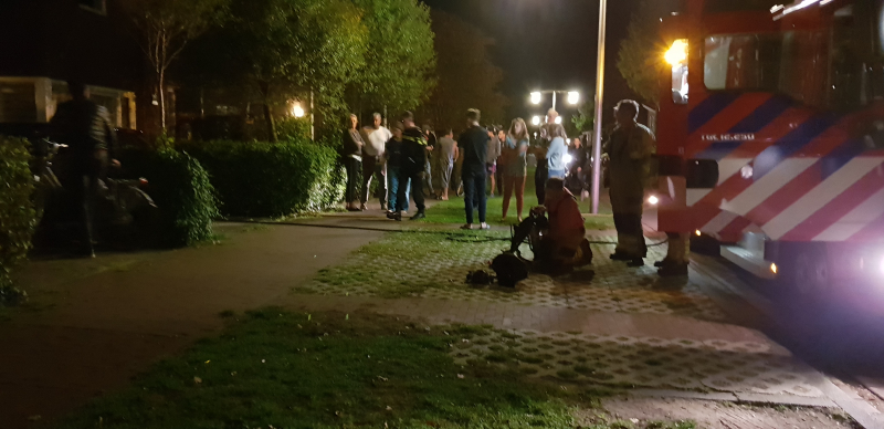 Aanbouw in brand woning vol rook