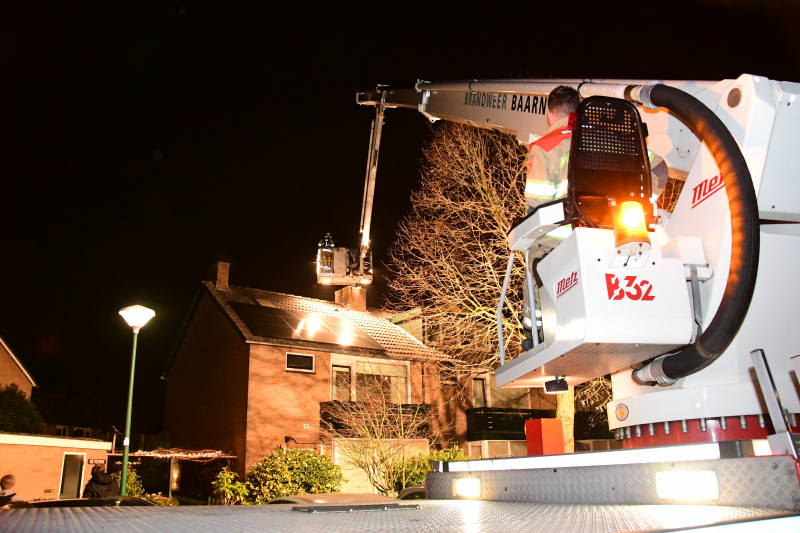 Woonkamer vol rook door schoorsteenbrand