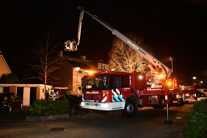 Woonkamer vol rook door schoorsteenbrand