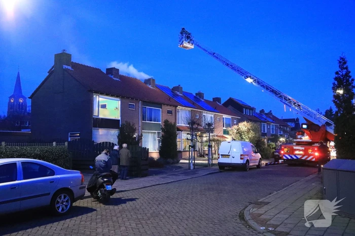 Veel rook bij schoorsteenbrand