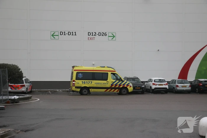 Persoon bekneld onder stelling