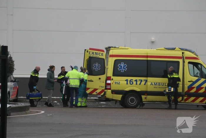 Persoon bekneld onder stelling