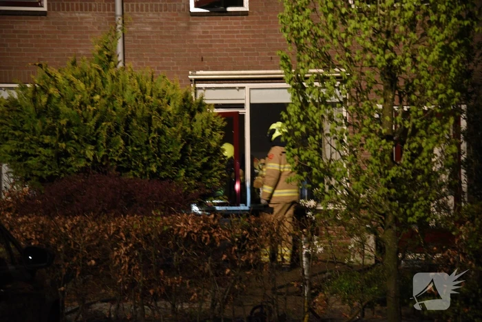 Woning vol rook door smeulende doeken