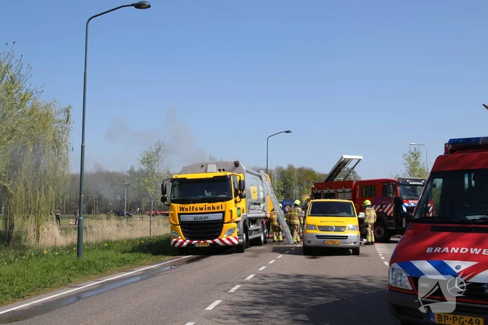 Inhoud vuilniswagen in brand