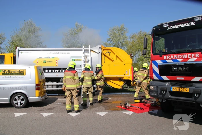Inhoud vuilniswagen in brand
