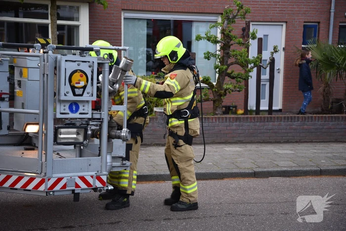 Brand in schoorsteen van woning