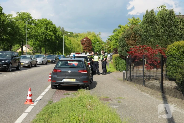 Politieauto botst op auto tijdens spoedrit
