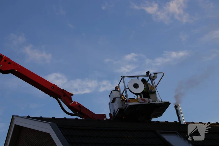 Veel rook bij schoorsteenbrand