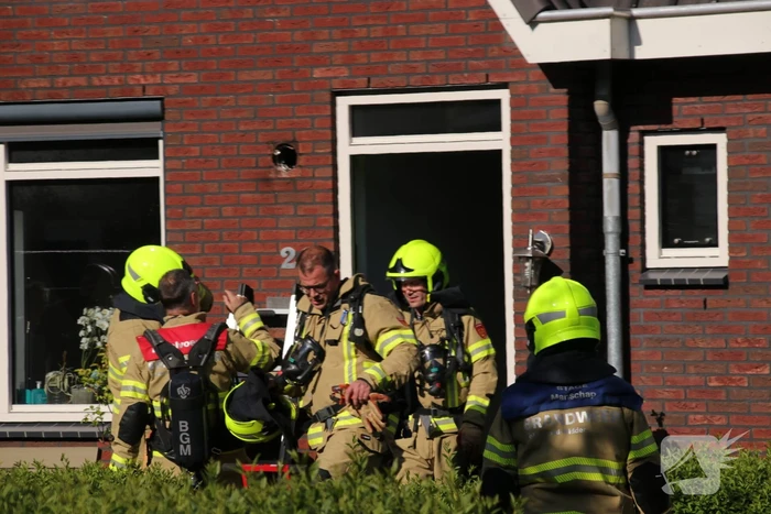 Afzuigkap in brand door frituurpan