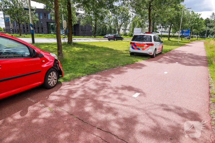 Schade na botsing op kruising
