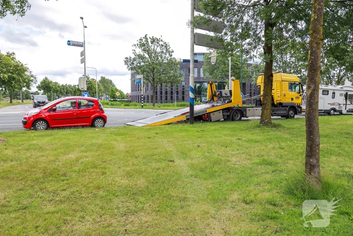 Schade na botsing op kruising