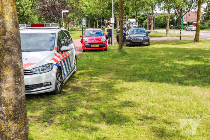 Schade na botsing op kruising