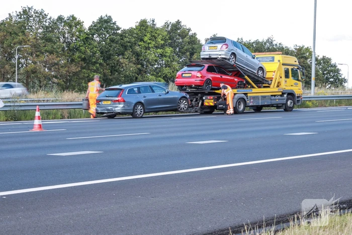 Drie auto's op elkaar