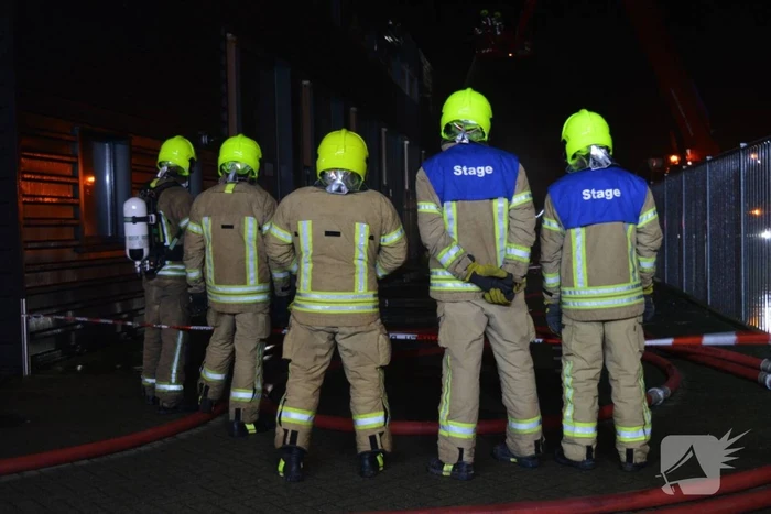 Negen woningen geÃ«vacueerd na brand in bedrijfspand