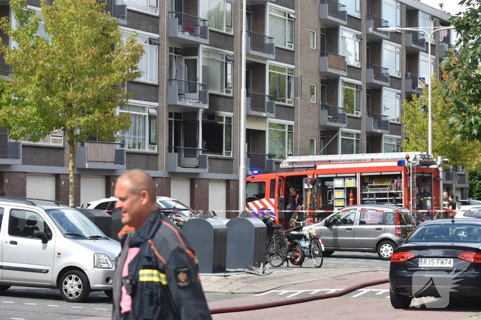 Kat gered bij uitslaande brand in flatwoning