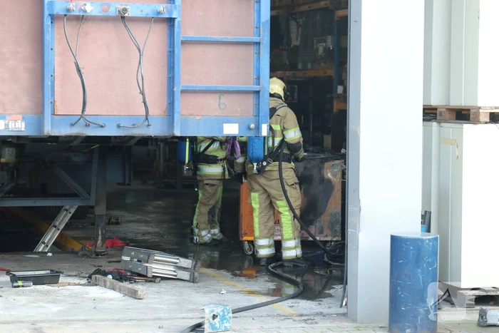 Bedrijf vol met rook na brand in lasapparaat