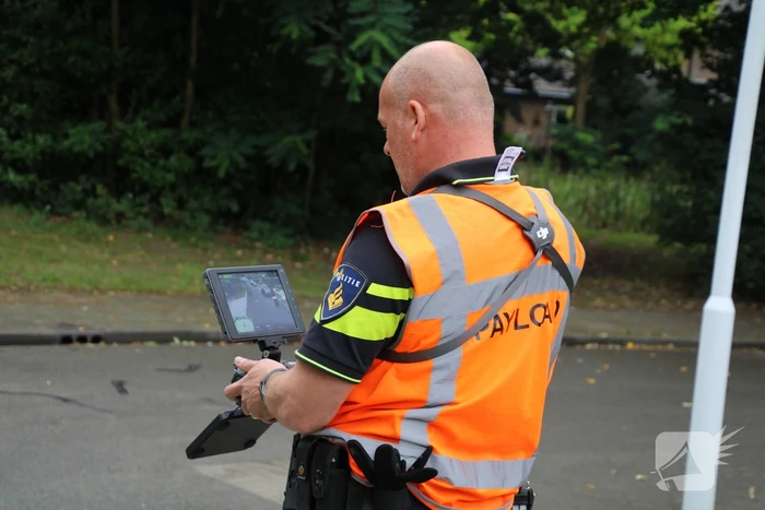 Fietsster botst tegen openstaande autoportier