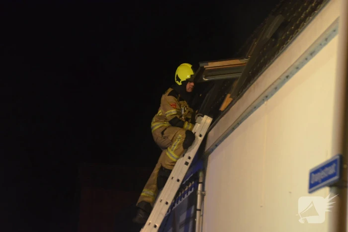 Oven vat vlam in woning