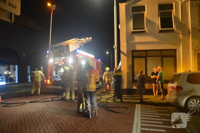 Oven vat vlam in woning