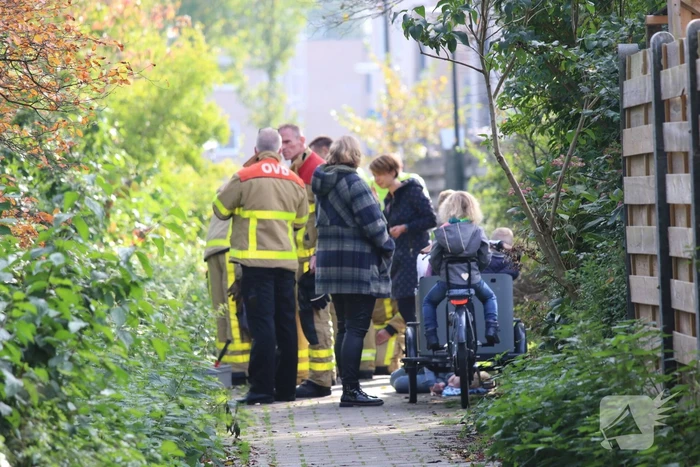 Kind met voet tussen de spaken