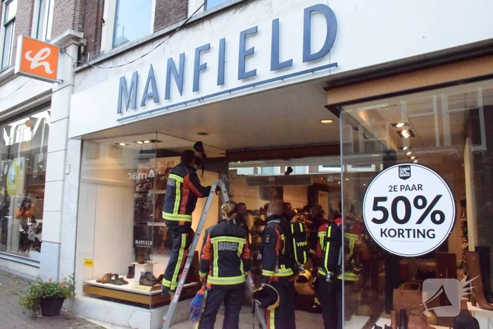 Brandlucht door smeulende transformator Manfield schoenenwinkel