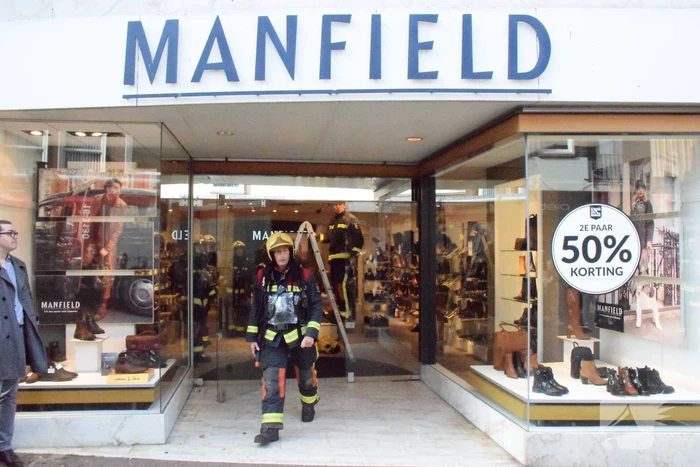 Brandlucht door smeulende transformator Manfield schoenenwinkel