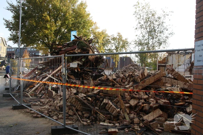 Trieste aanblik uitgebrande winkelpand