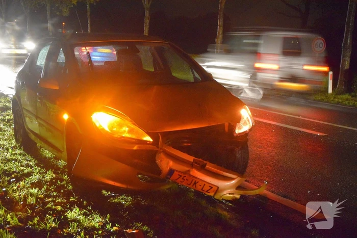 Vier personenautos met elkaar in botsing