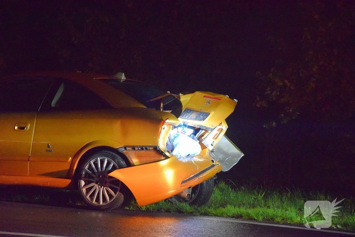 Vier personenautos met elkaar in botsing