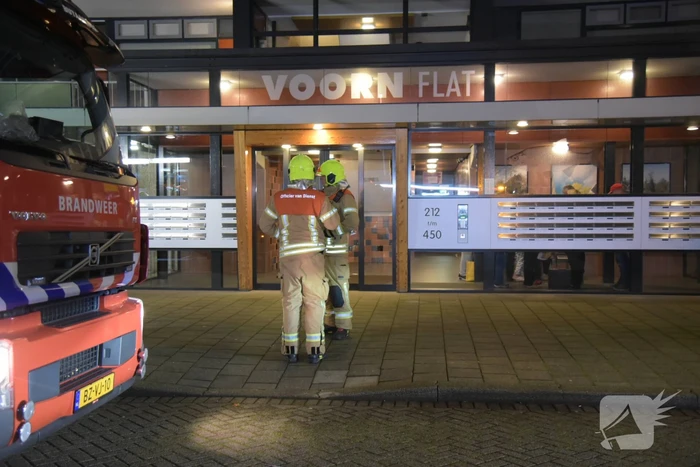 Grote uitslaande brand in flatwoning