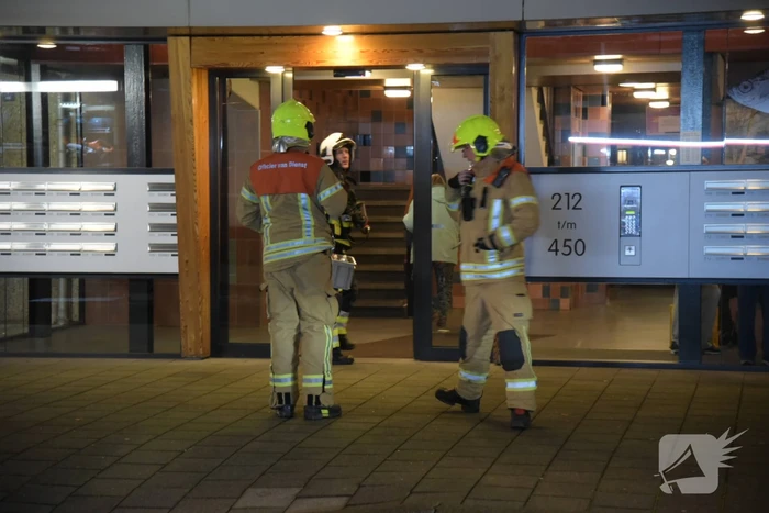 Grote uitslaande brand in flatwoning