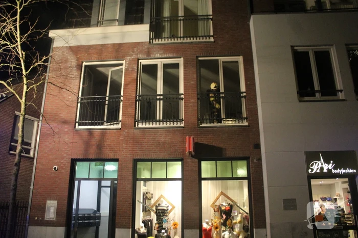 Brand door bouwlamp in appartement
