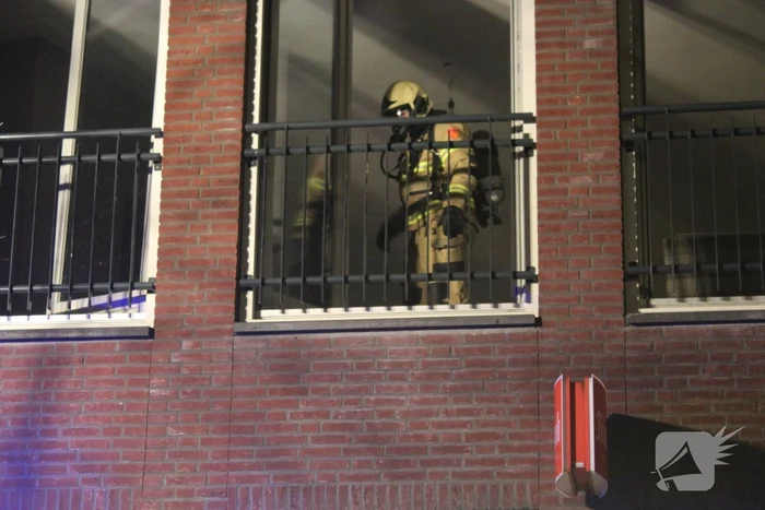 Brand door bouwlamp in appartement
