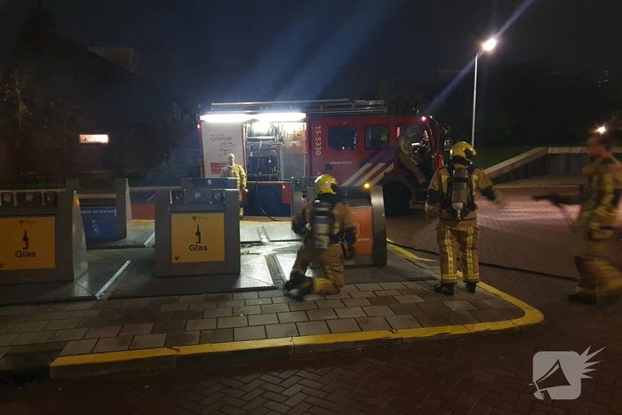 Brandweer druk met containerbrand
