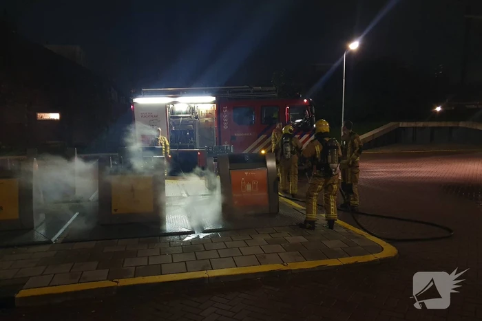 Brandweer druk met containerbrand