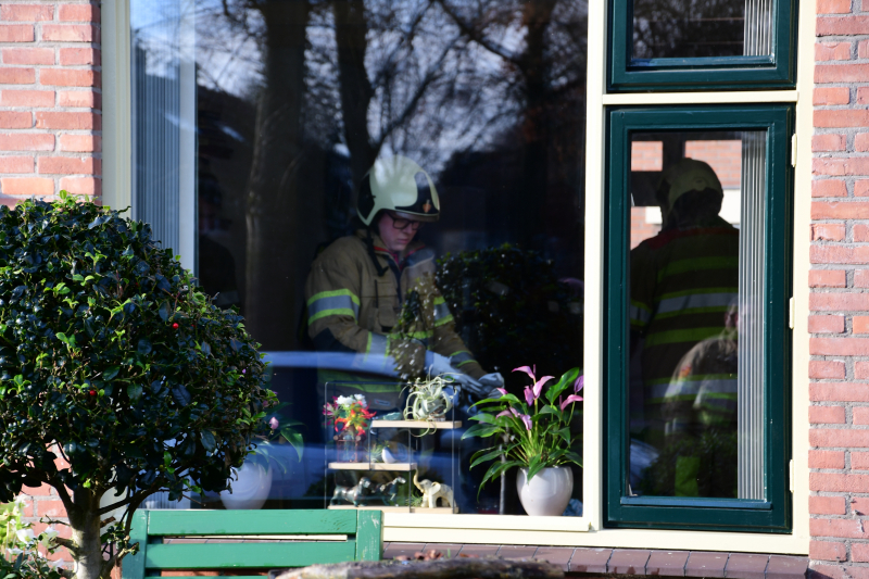 Onderzoek naar brandhoutlucht in huis