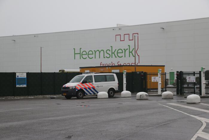 Persoon bekneld onder stelling